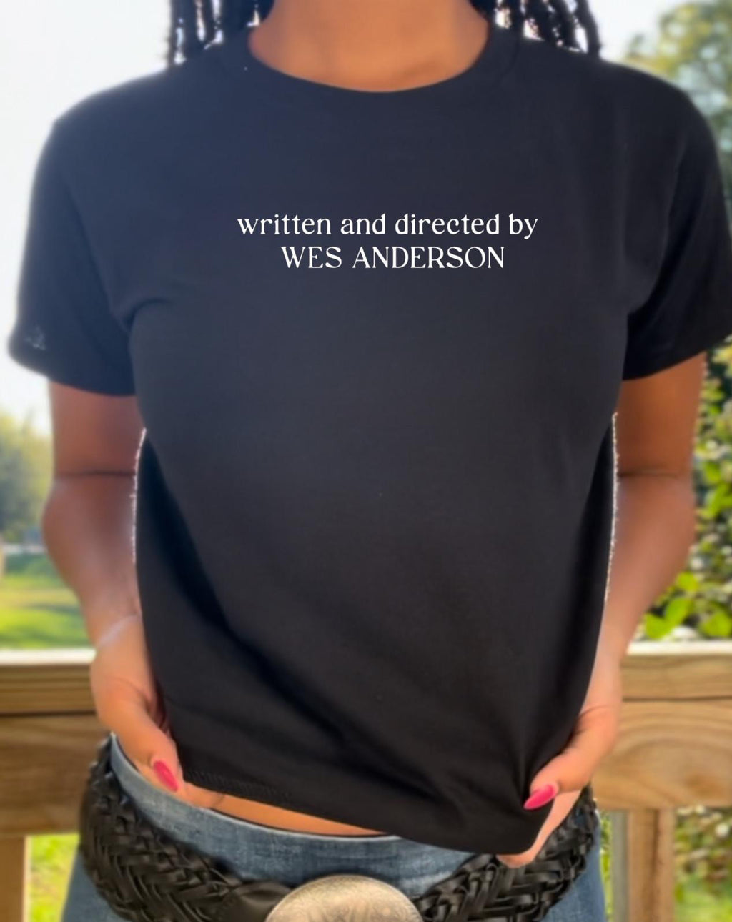 written and directed by Wes Anderson baby tee. Wes Anderson baby tee. The grand Budapest hotel. Fantastic Mr fox. Asteroid city. Movie lover